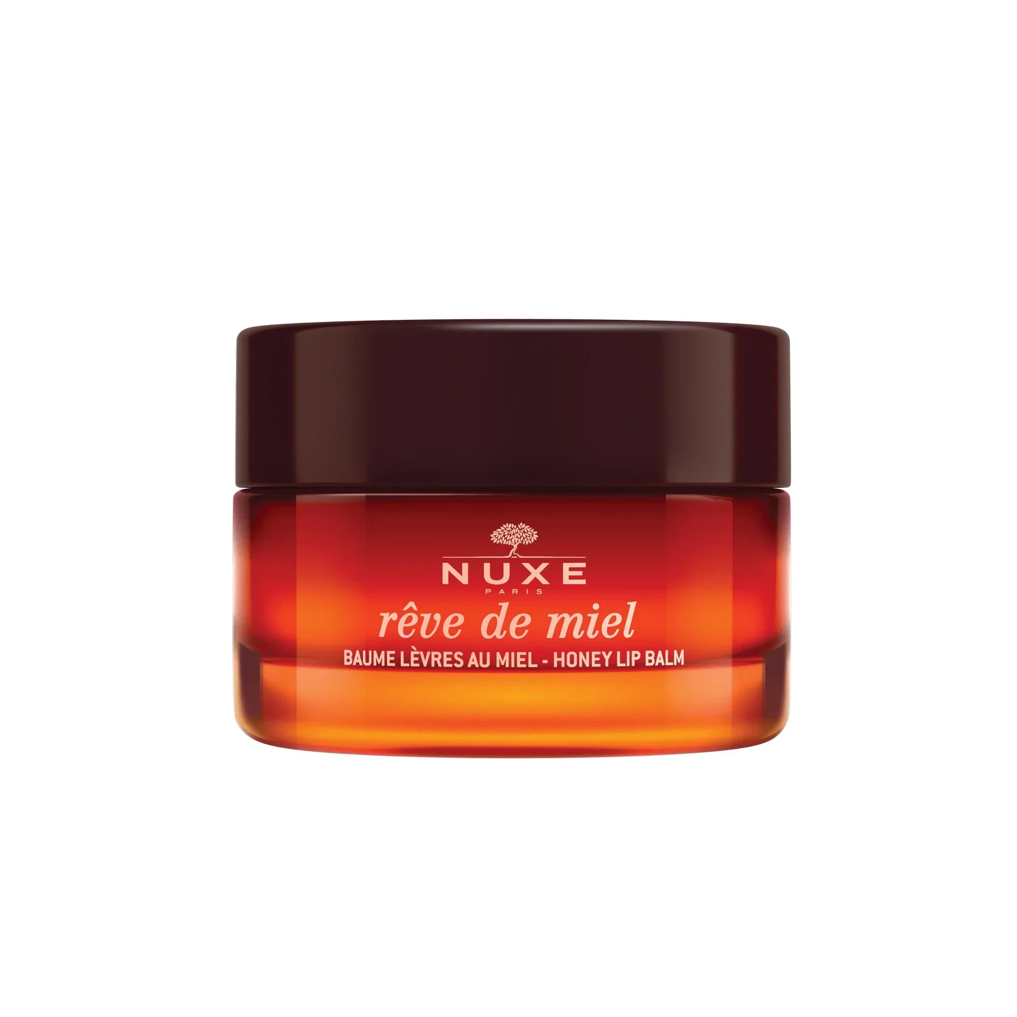 Balsamo labbra Nuxe Rêve de Miel in vasetto ambrato, idratante e nutriente.